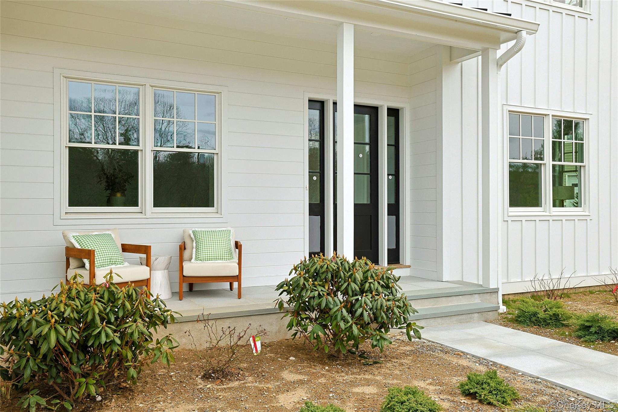 86 Old Byram Lake Road Armonk, NY 10504 - Photo 5 of 44 front view of a house with a yard