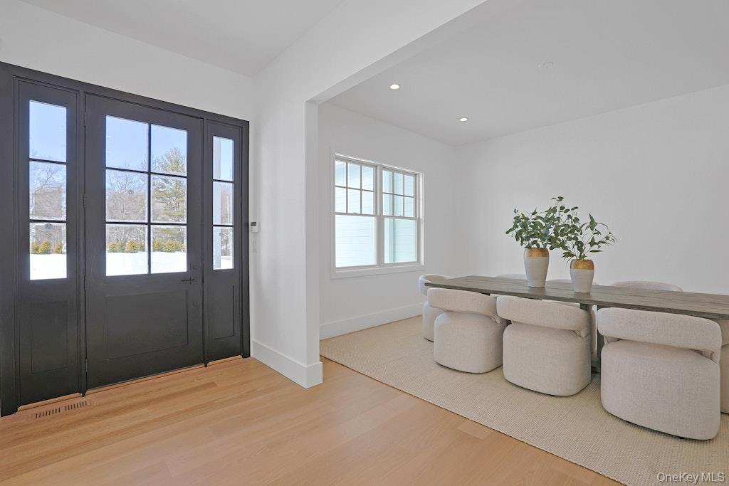 86 Old Byram Lake Road Armonk, NY 10504 - Photo 8 of 44 a bedroom with furniture and a potted plant