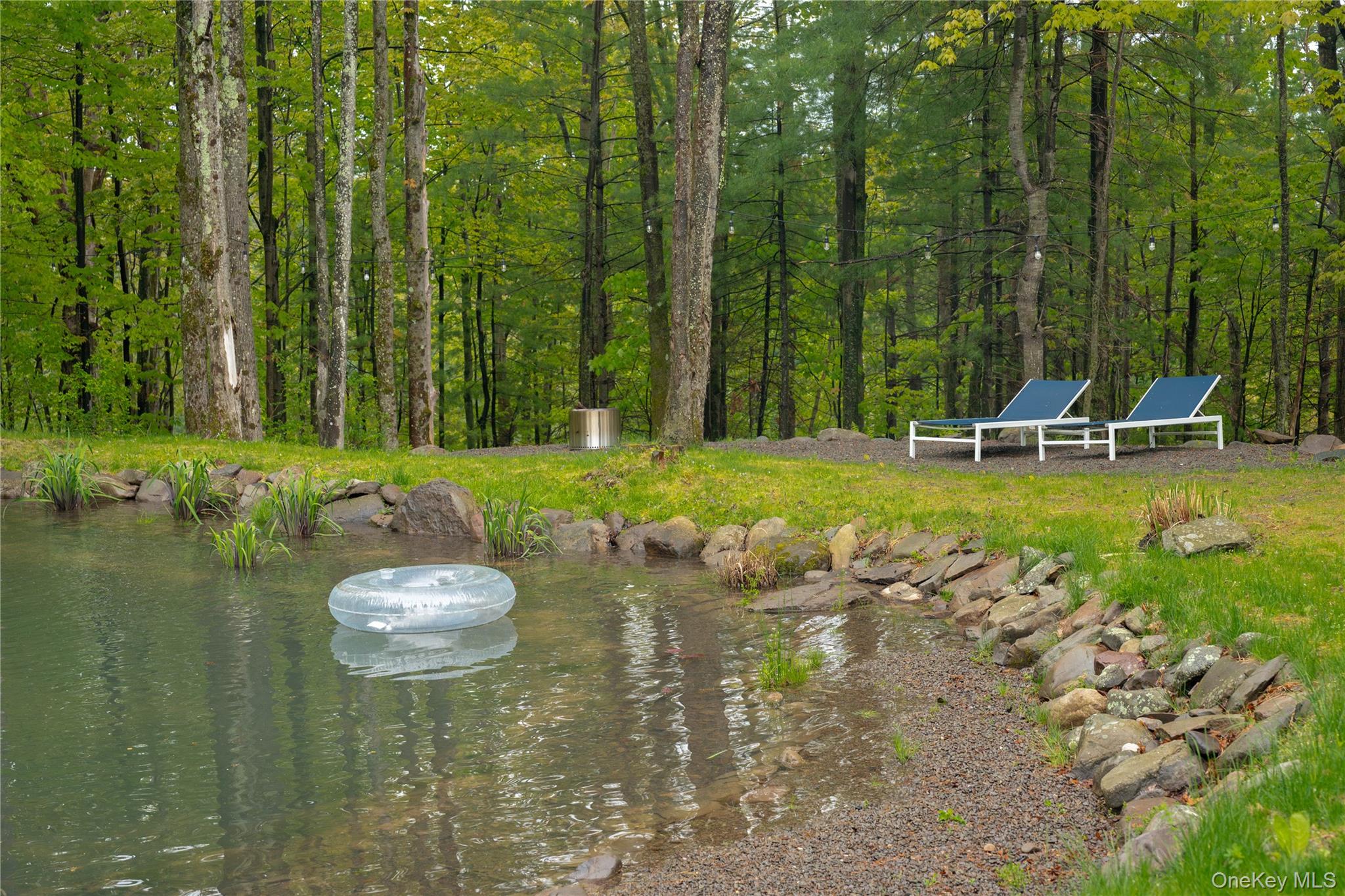 22 Mc Guffey Road Kerhonkson, NY 12446 - Photo 5 of 24 a view of a lake with a park