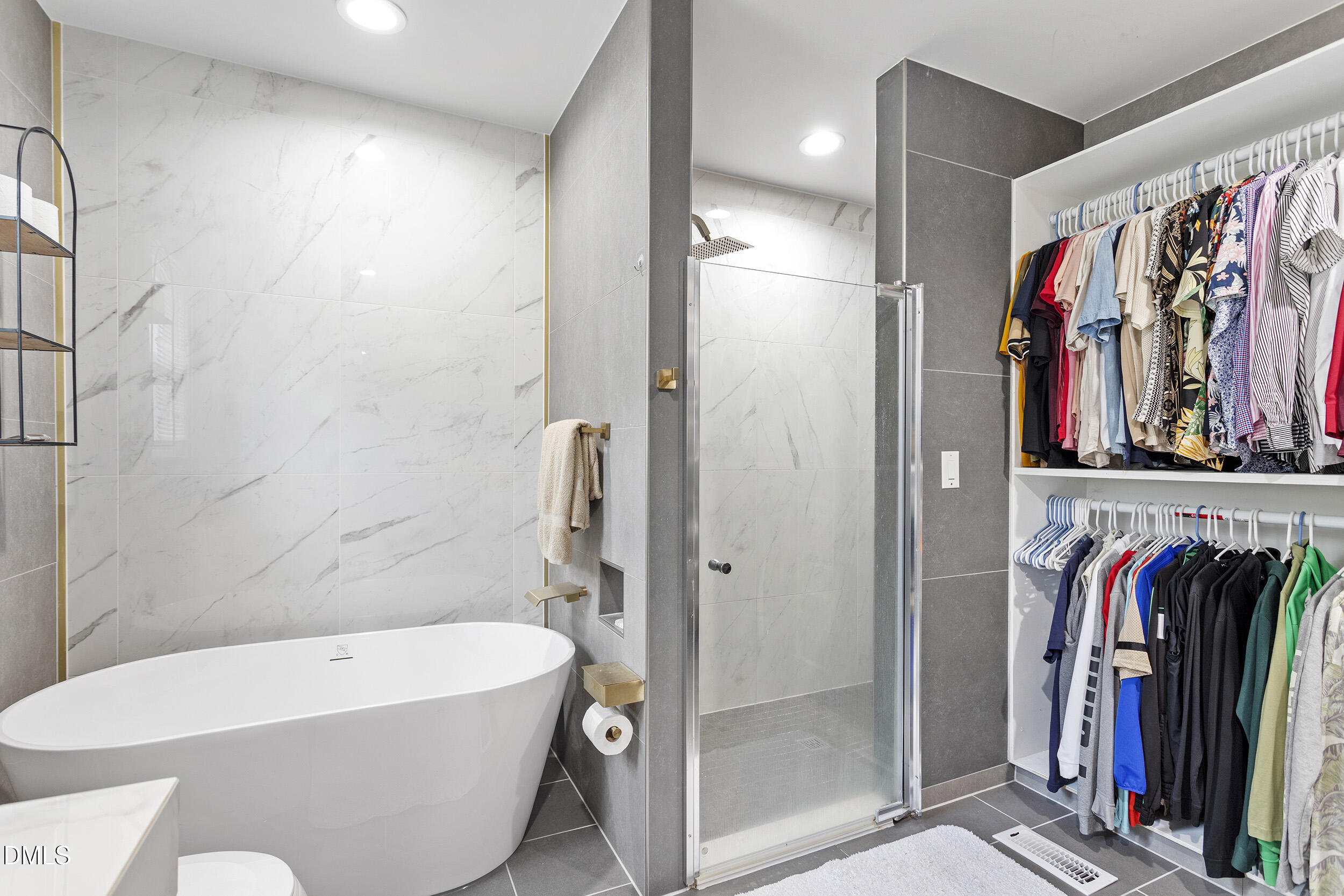 5809 Iris Lake Court Raleigh, NC 27604 - Photo 16 of 29 a bathroom with a bathtub and a shower