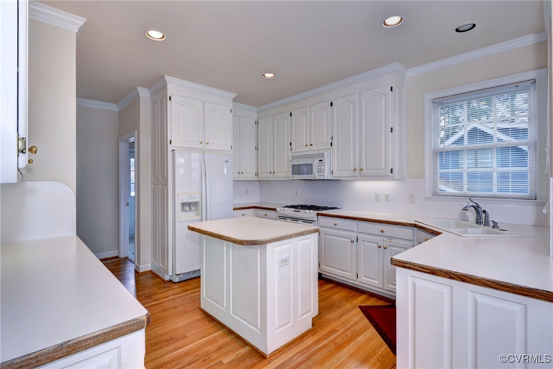 3092 North Riverside Drive Lanexa, VA 23089 - Photo 27 of 50 Kitchen featuring
white appliances, wood floors