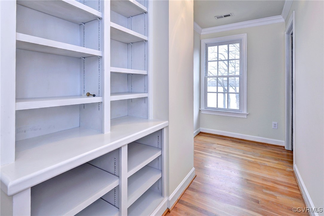3092 North Riverside Drive Lanexa, VA 23089 - Photo 36 of 50 built-in cabinets in hallway leading to staits to
