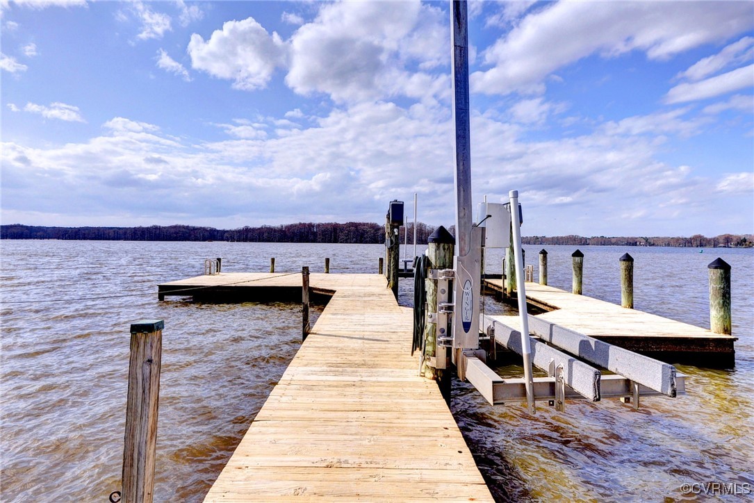 3092 North Riverside Drive Lanexa, VA 23089 - Photo 9 of 50 View of dock with fishing platform, boat lify, two