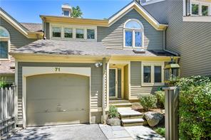 71 Boulder Ridge Road Scarsdale, NY 10583 - Photo 1 of 1 a front view of a house with a yard