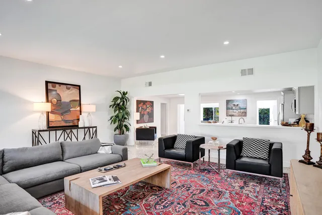 a living room with furniture and a couch