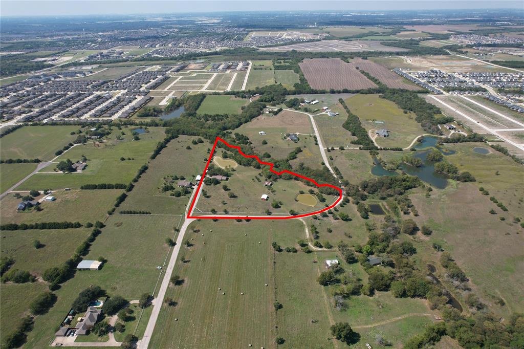 8592 Mckissick Meadows Road Princeton, TX 75407 - Photo 5 of 7 an aerial view of a house with a yard