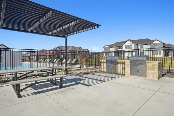 a view of a terrace with a lounge chair