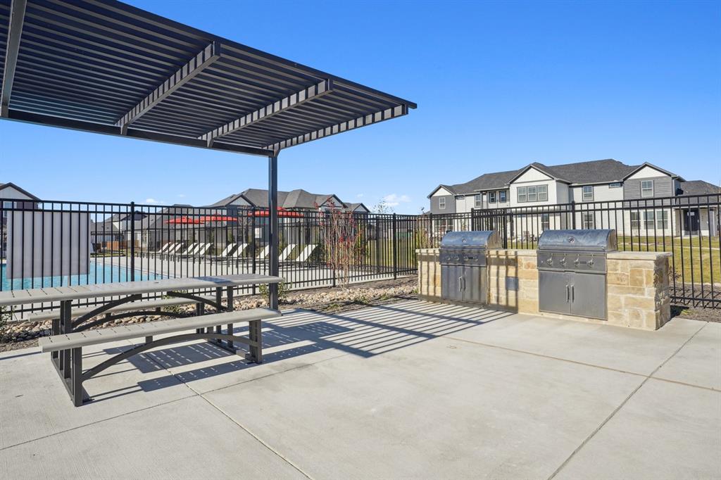 2921 Canvas Way Anna, TX 75409 - Photo 14 of 22 a view of a terrace with a lounge chair