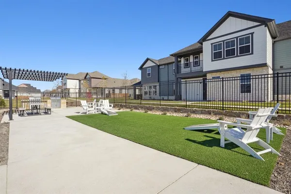 a view of a house with a swimming pool