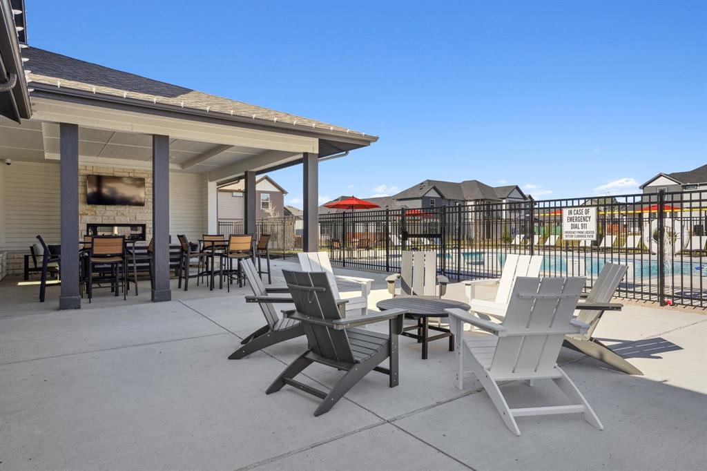 2921 Canvas Way Anna, TX 75409 - Photo 19 of 22 a view of a patio with dining table and chairs