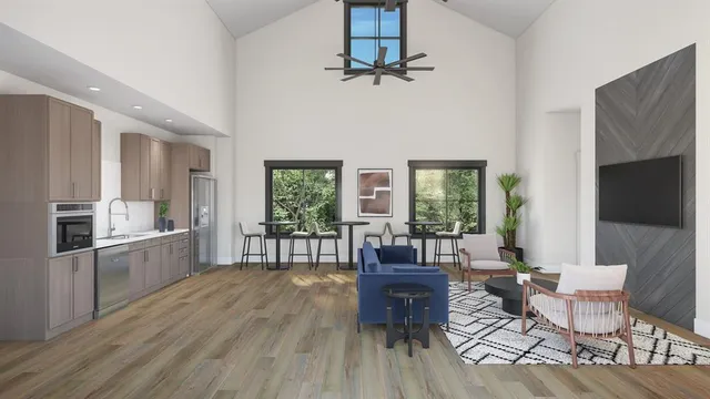 a living room with fireplace furniture and a wooden floor