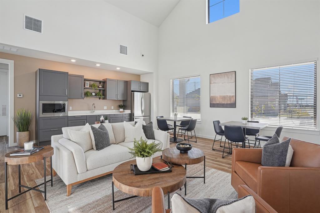 2921 Canvas Way Anna, TX 75409 - Photo 9 of 22 a living room with furniture and a large window