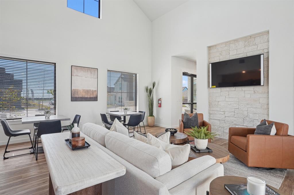 2921 Canvas Way Anna, TX 75409 - Photo 10 of 22 a living room with furniture and a flat screen tv