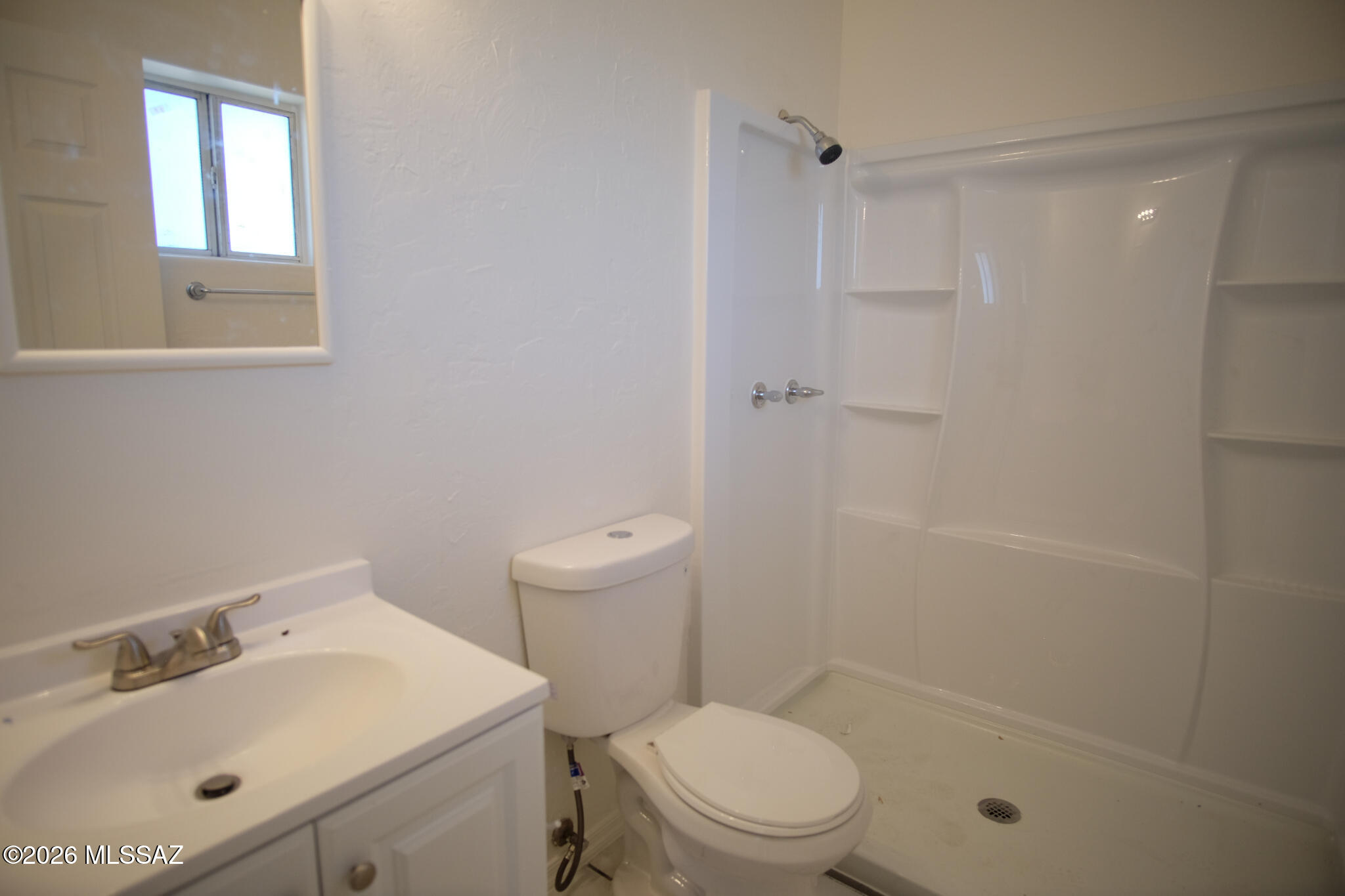 345 East Delta Road Tucson, AZ 85706 - Photo 21 of 45 a bathroom with a sink toilet and shower