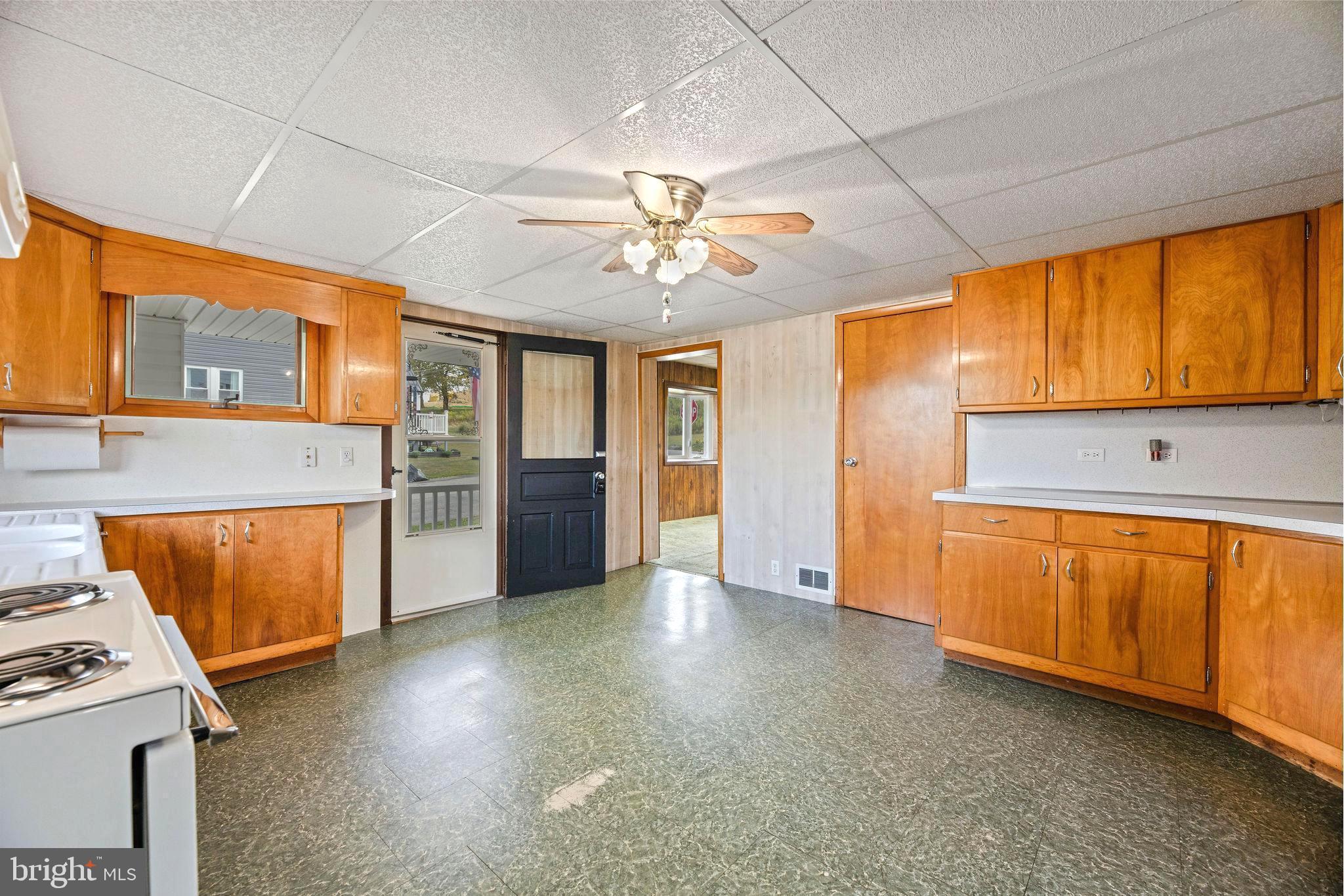 113 Loch Lomond Road Philipsburg, PA 16866 - Photo 13 of 33 a view of a kitchen with a sink and a stove top oven