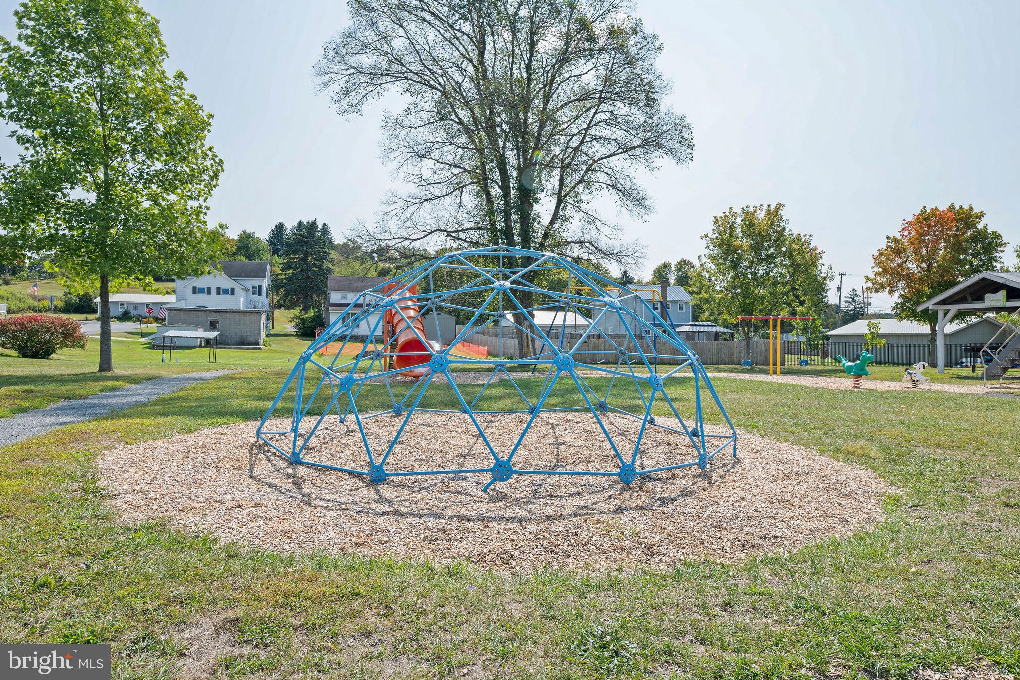 113 Loch Lomond Road Philipsburg, PA 16866 - Photo 10 of 33 a view of a park with swings and slides
