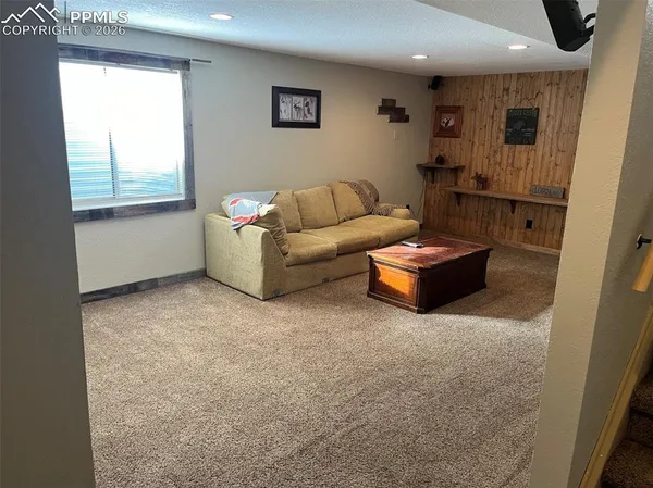 a view of a livingroom with furniture