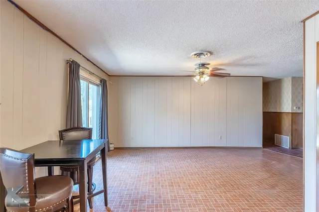 a view of a livingroom with furniture