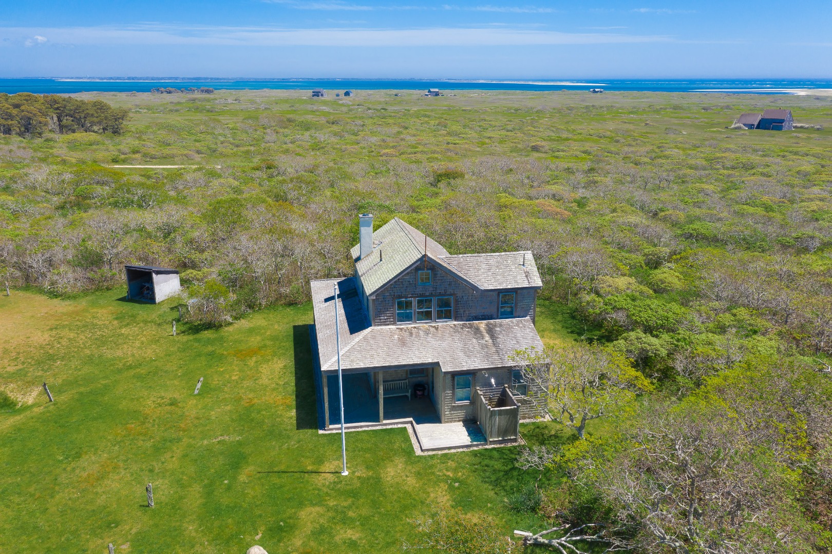 94-21 Tuckernuck Nantucket, MA 02554 - Photo 18 of 20 a aerial view of a house with a yard