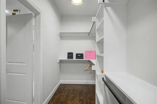 a hallway with storage and utility