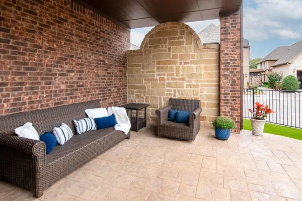 a view of swimming pool with seating space