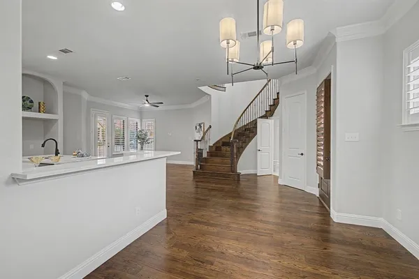 a view of entryway and kitchen
