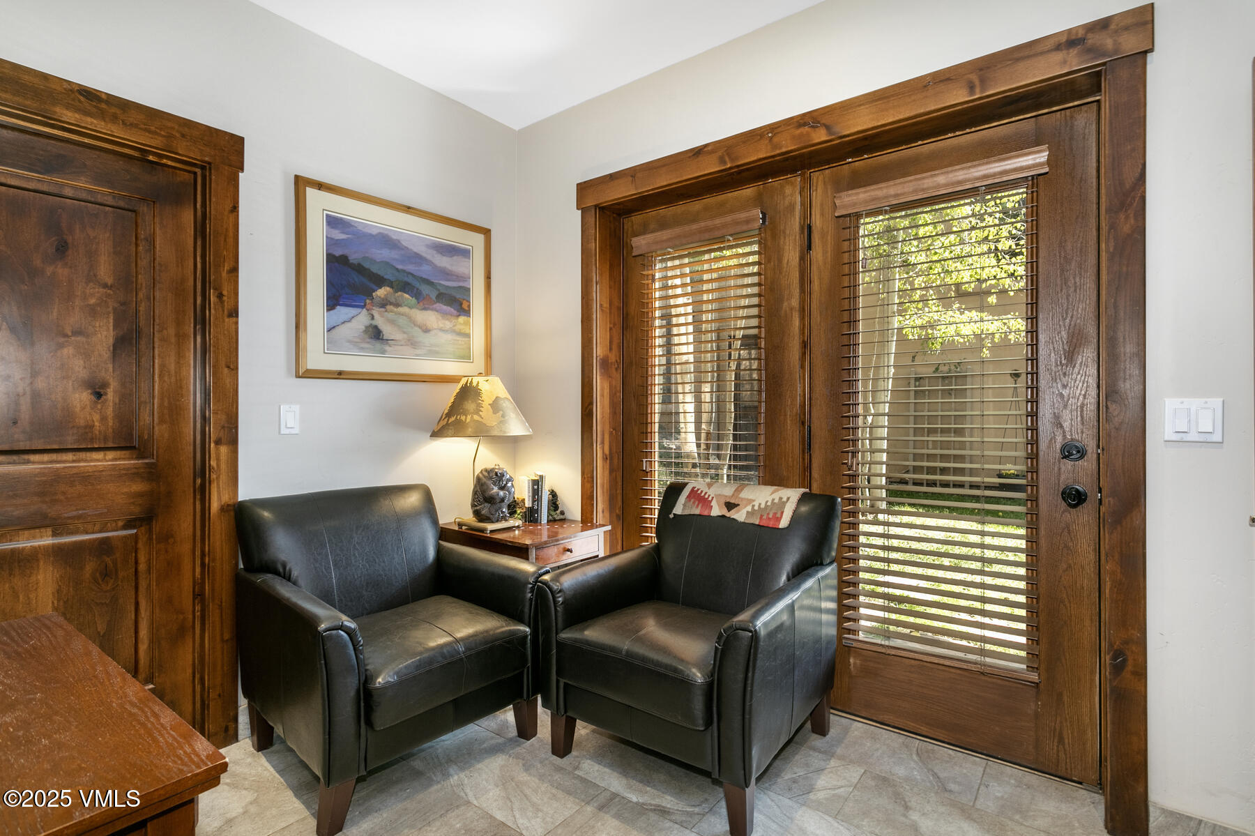 1015 West Wildwood Road, Unit H Avon, CO 81620 - Photo 11 of 38 a living room with furniture and a window