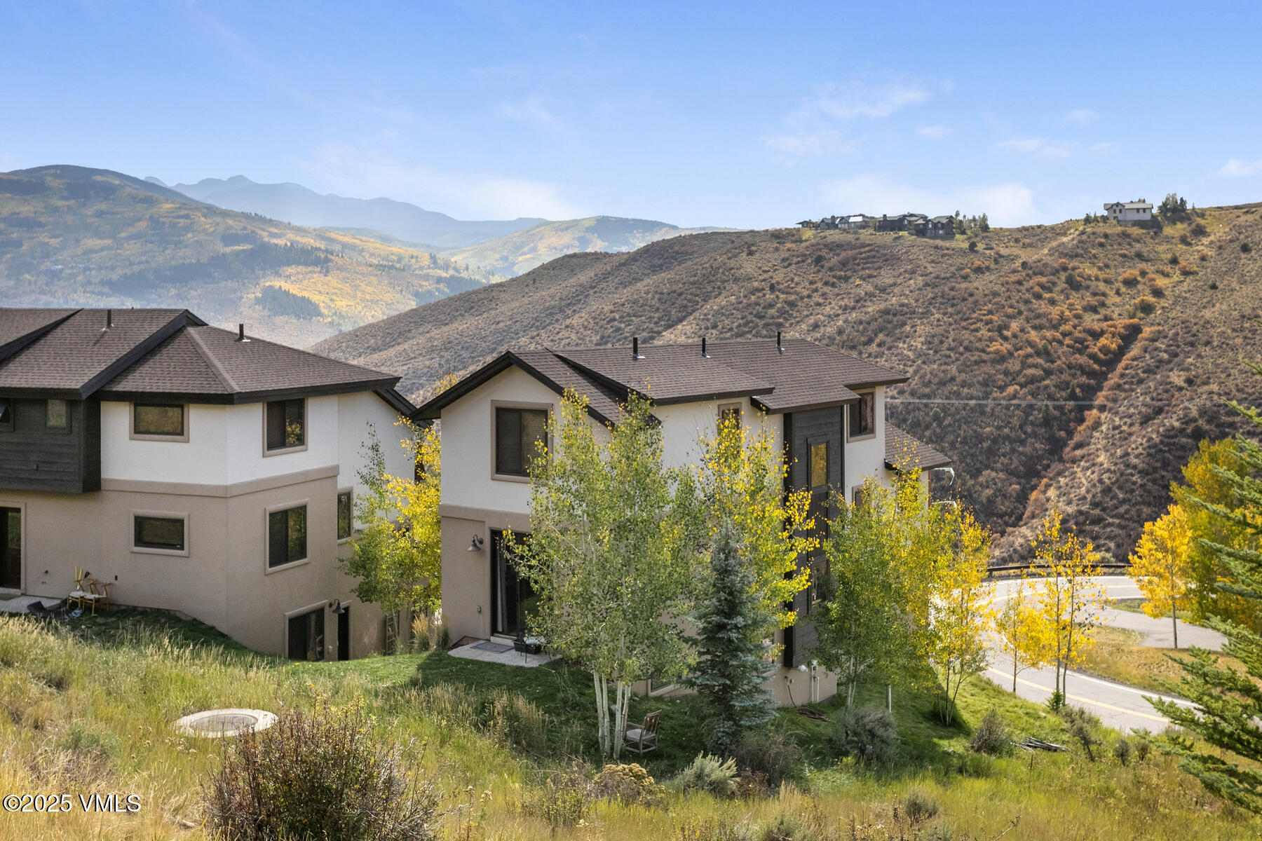 1015 West Wildwood Road, Unit H Avon, CO 81620 - Photo 33 of 38 a aerial view of a house with a yard