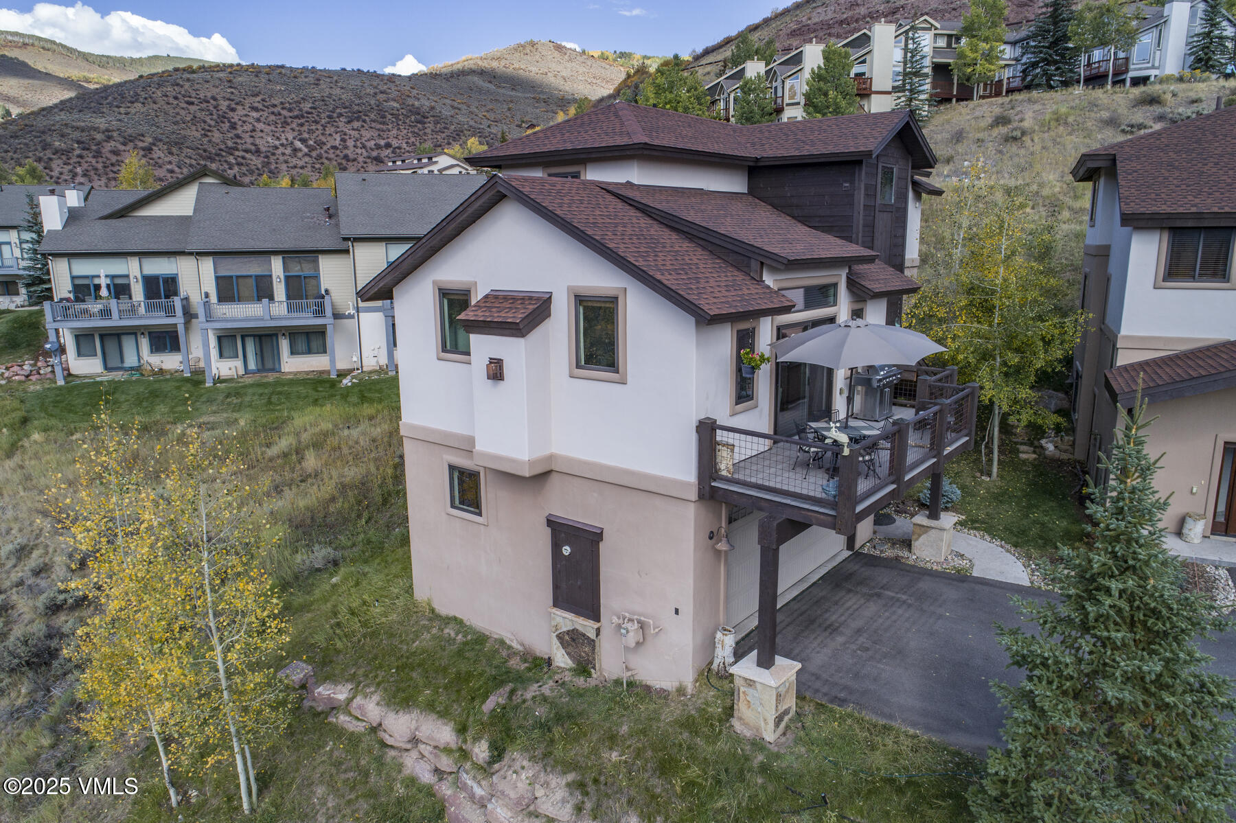 1015 West Wildwood Road, Unit H Avon, CO 81620 - Photo 35 of 38 a front view of a house with garden