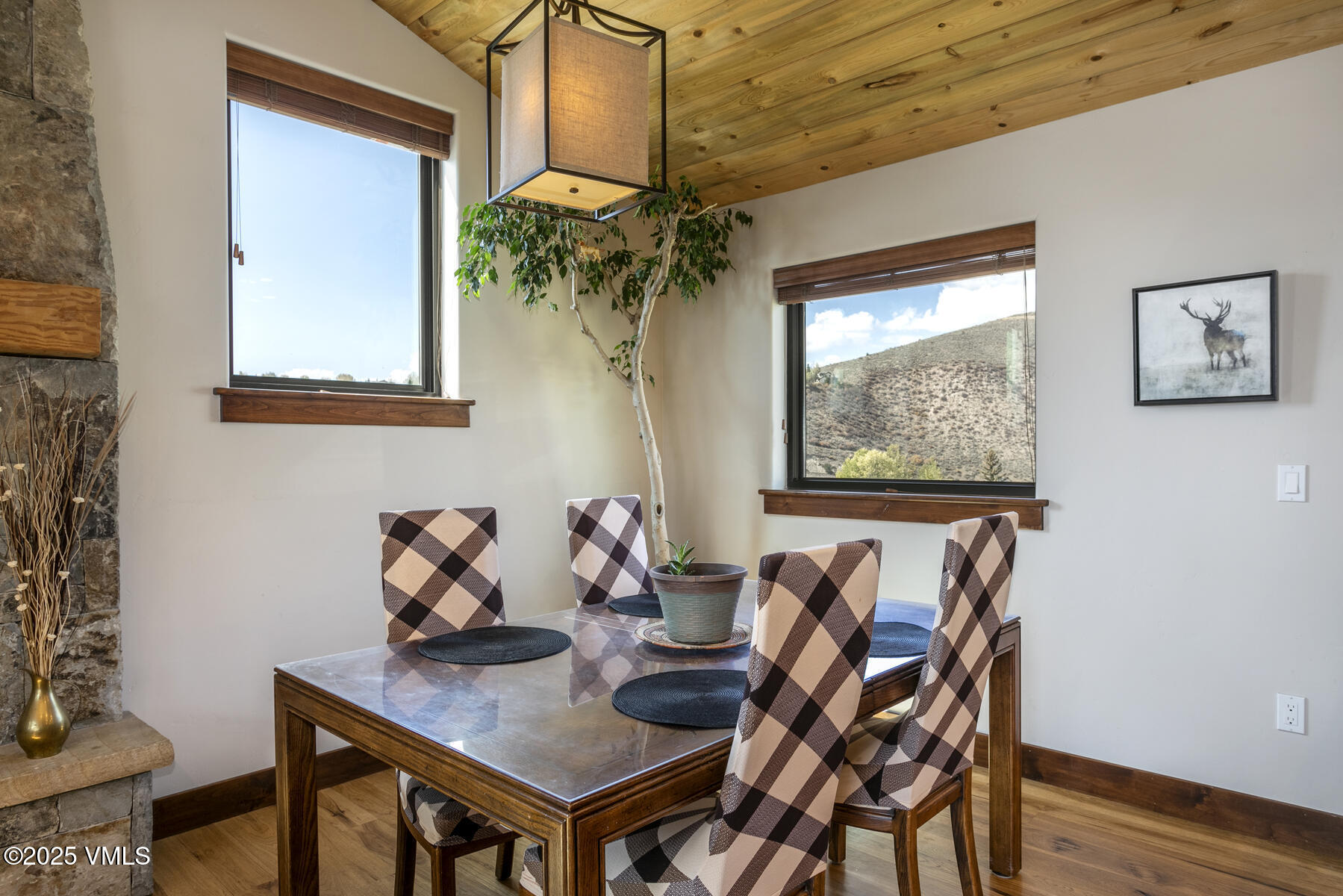 1015 West Wildwood Road, Unit H Avon, CO 81620 - Photo 6 of 38 a dining room with furniture and window
