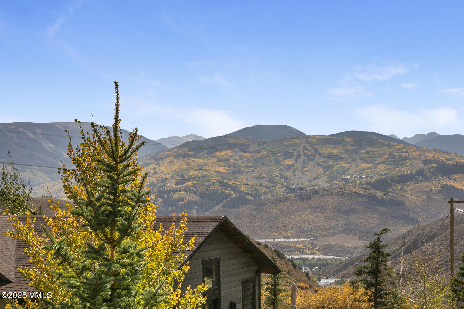 1015 West Wildwood Road, Unit H Avon, CO 81620 - Photo 8 of 38 a view of a house with a mountain