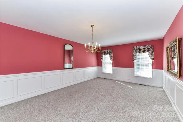 a kitchen with a sink stove and refrigerator