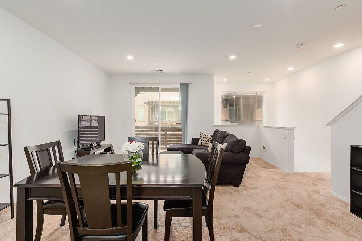 2770 Sparta Road, Unit 2 Chula Vista, CA 91915 - Photo 8 of 25 Upstairs Living Space - Looking from the Kitchen towards the Living Area and Balcony, Stairs coming up are on the Right side of photo...