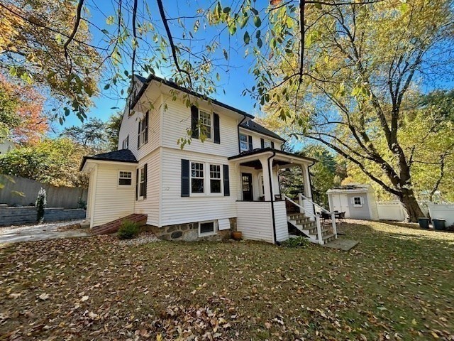29 Station Street Sharon, MA 02067 - Photo 2 of 42 a view of a white house with a yard