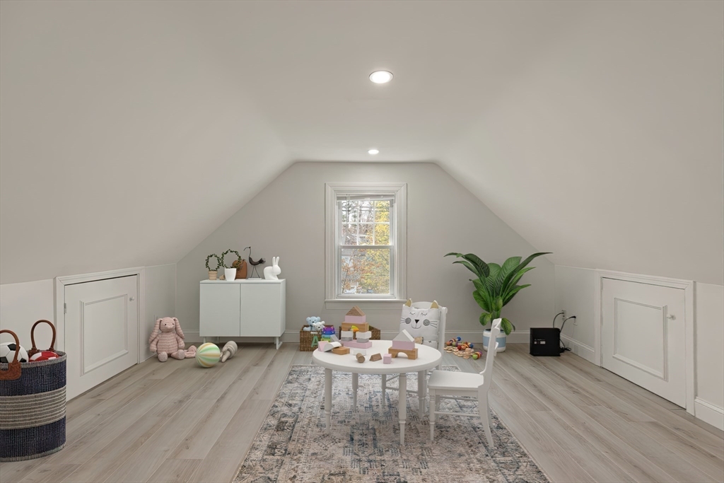 29 Station Street Sharon, MA 02067 - Photo 34 of 42 a living room with furniture and a potted plant