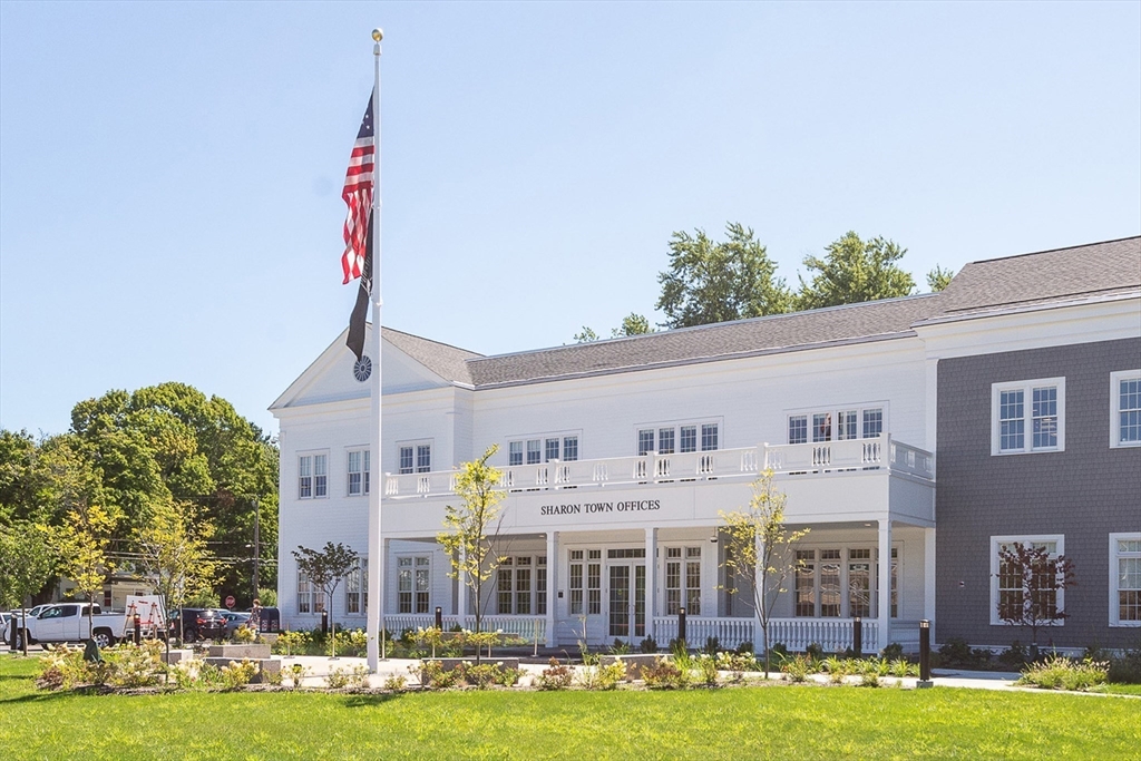 29 Station Street Sharon, MA 02067 - Photo 39 of 42 a front view of building with yard swimming pool and outdoor seating