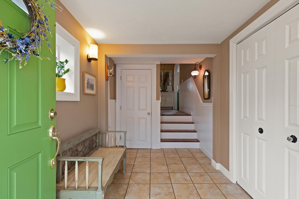 29 Station Street Sharon, MA 02067 - Photo 7 of 42 a view of entryway and hall with wooden floor