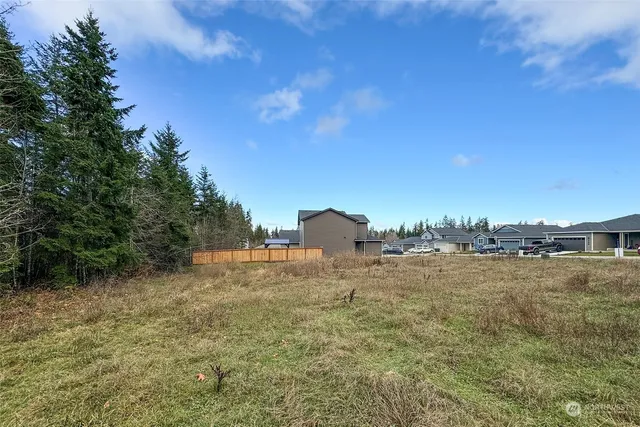 a small bathroom with a shower and a mirror