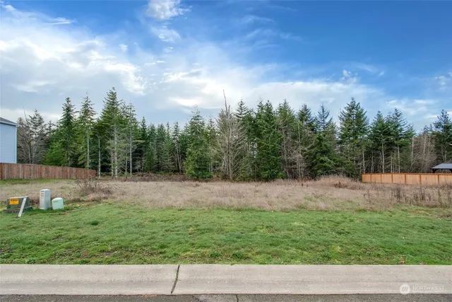 a fire hydrant in the middle of a field