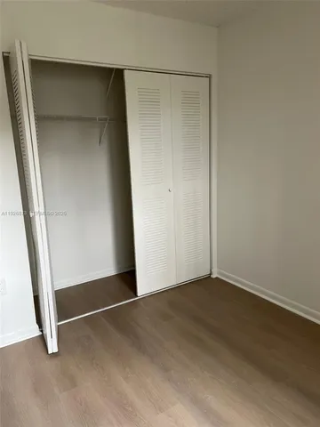 an empty room with closet