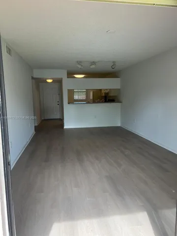 a view of a big room with a garage