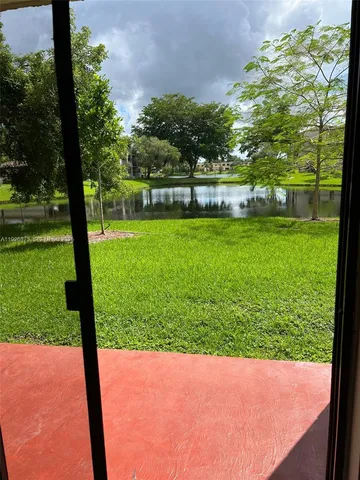 a view of yard with an outdoor space