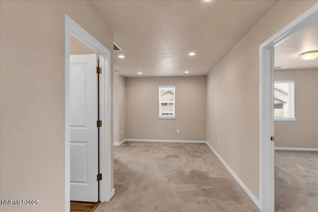 a view of livingroom with a ceiling fan