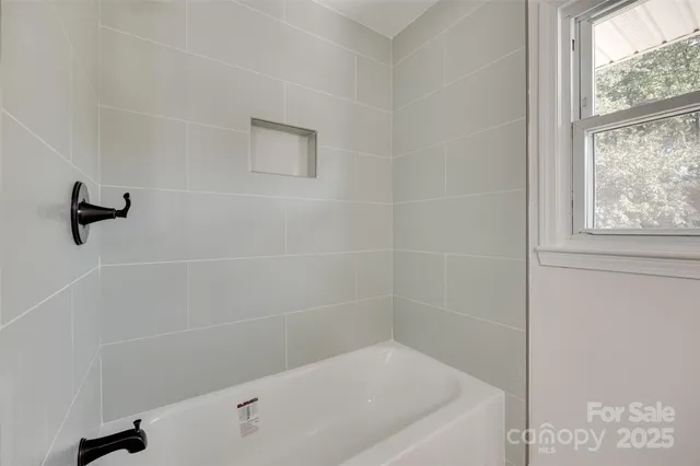 a bathroom with a bathtub