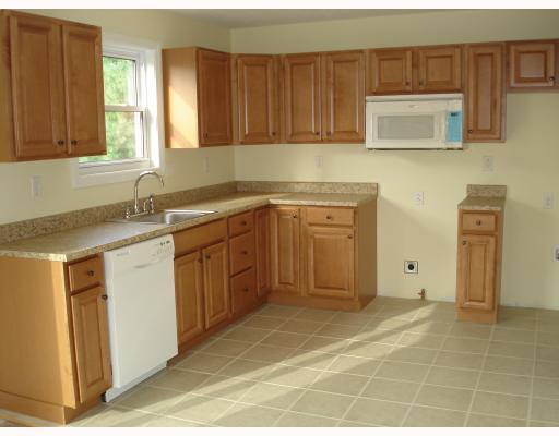 504 Commerce Street Pittsburgh, PA 15215 - Photo 3 of 11 Kitchen. The built-in microwave is a wonderful convenience and the space for the oven has been set up for gas and electric so that they buyer has flexibility.