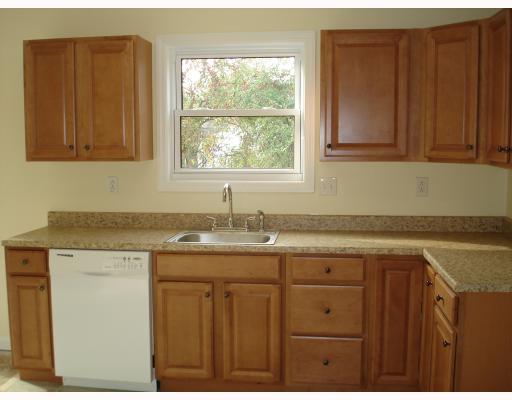 504 Commerce Street Pittsburgh, PA 15215 - Photo 4 of 11 Kitchen. The dishwasher and large sink make cleaning up easy. The abundant cabinetry is beautiful!
