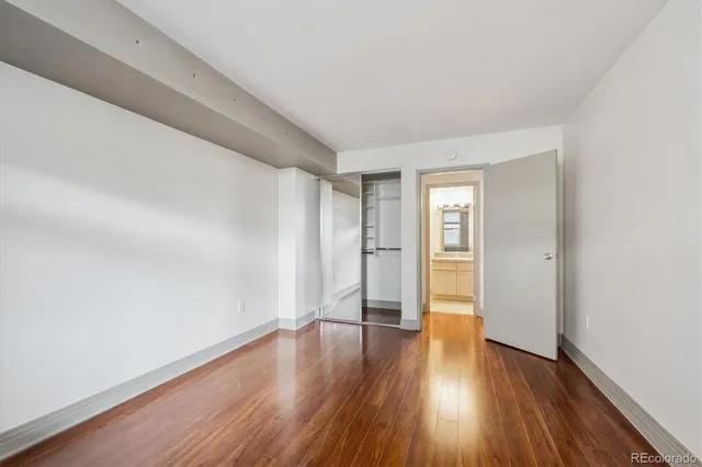 a view of wooden floor in an empty room