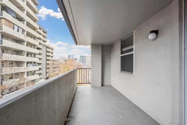 a view of a hallway with washer and dryer