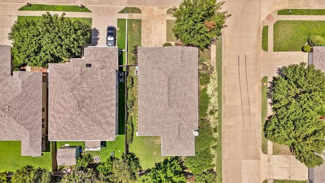 an aerial view of residential building with parking space