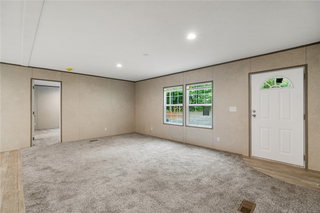 419 Austin Drive Anderson, SC 29624 - Photo 11 of 36 This inviting space features natural light and plush carpeting, perfect for comfortable living.